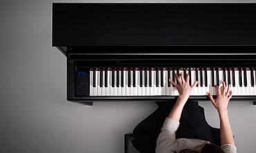 太阳成集团tyc1050Clavinova? CLP-585  荣获“红点设计大奖”